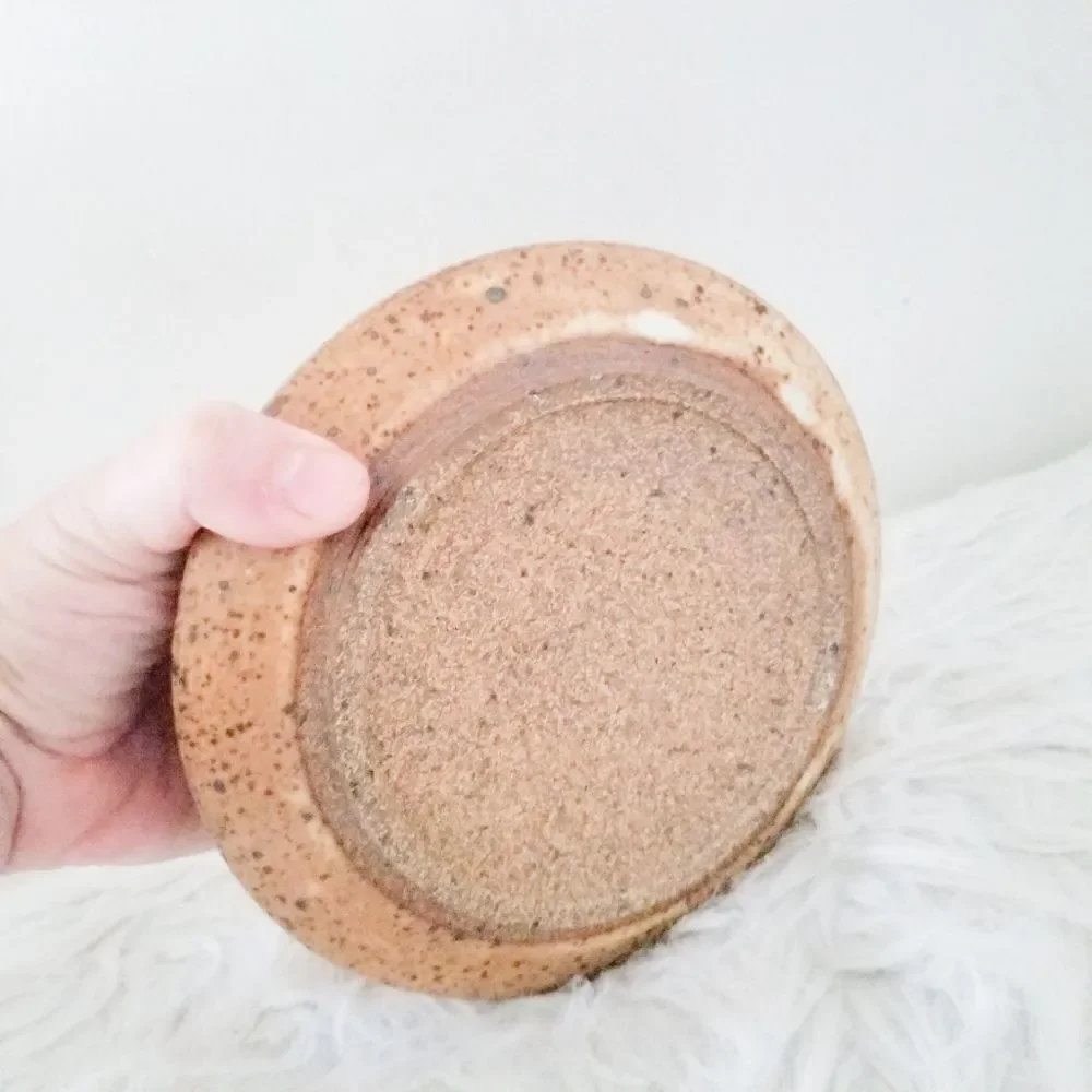 Pottery covered plate earth tones with blue